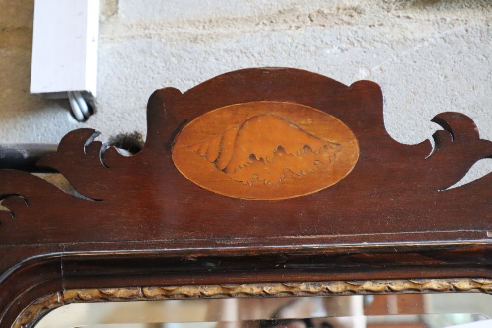 A Georgian style inlaid mahogany fret cut wall mirror, 39 x 76cm